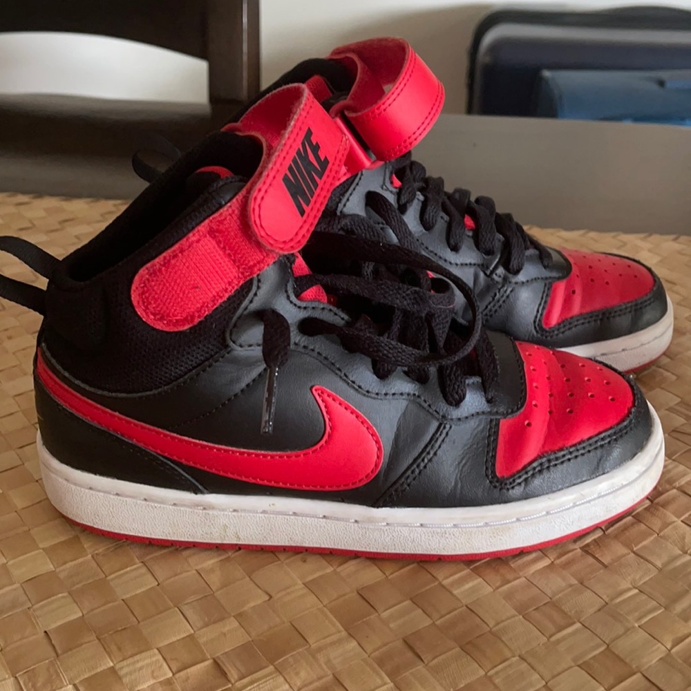 Nike red and black Jordan’s size 3,5 Y